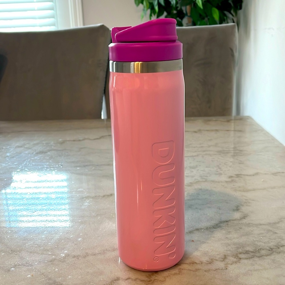 Dunkin’ pink cup with purple straw lid